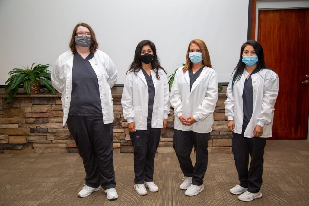 Pharmacy Tech students pictured are: Charley Thomason, Karen Garcia, Courteney Pless, and Ayshley Bautista.