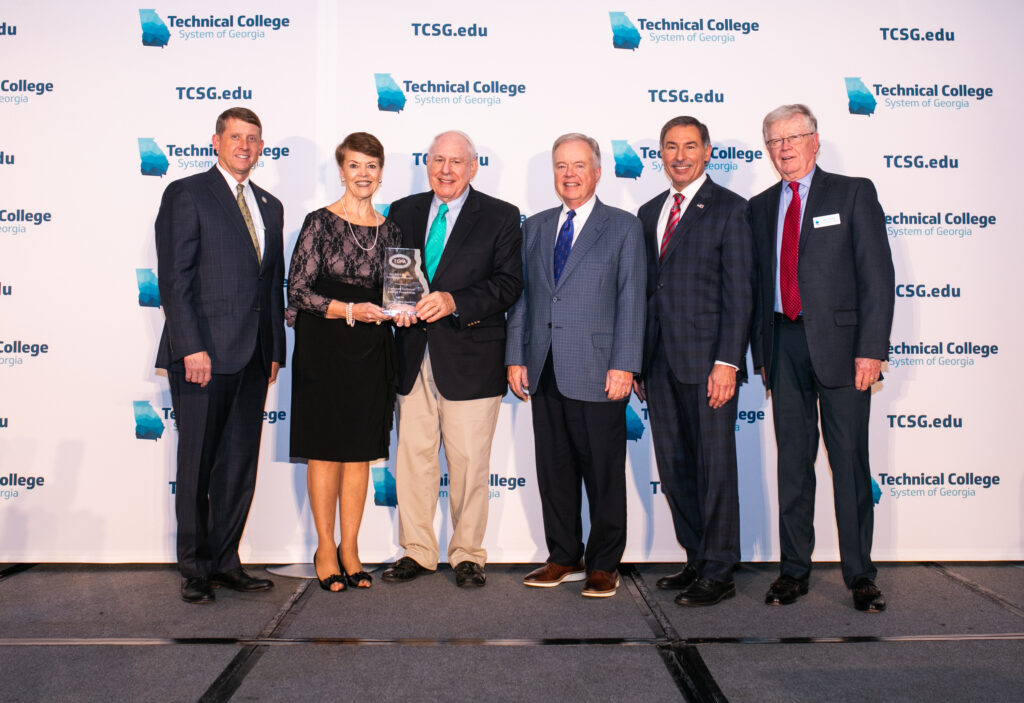 Photo: Foundation Board Award 2021: TCSG Commissioner Greg Dozier; NGTC Director of Institutional Advancement Cynthia Brown; NGTC Foundation board of trustees member Don Higgins; NGTC President John Wilkinson; TCFA President Mike Cheokas; and TCFA Past-President John DeVeer. 
