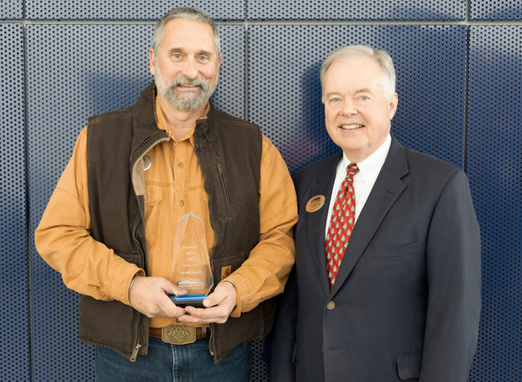 2022 Employee of the Year Award (left to right): Employee of the Year Darin Boozer and NGTC President John Wilkinson.  