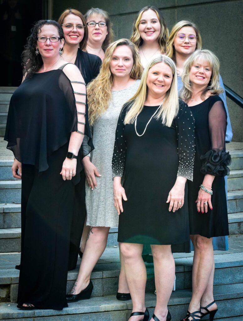 Pictured (front left to right): Angela Banks, adviser; Mona Williams, adviser; (middle left to right) Nicole Edwards; Emily Linz; Samantha Byers; (back left to right) Jessica Smith; Nicole May; and Alexis Whittemore; (not pictured) Emily Sullens, adviser. 