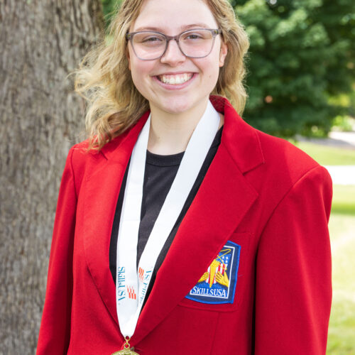 11Pictured: Culinary Arts student Hannah Nelson with national SkillsUSA gold medal.