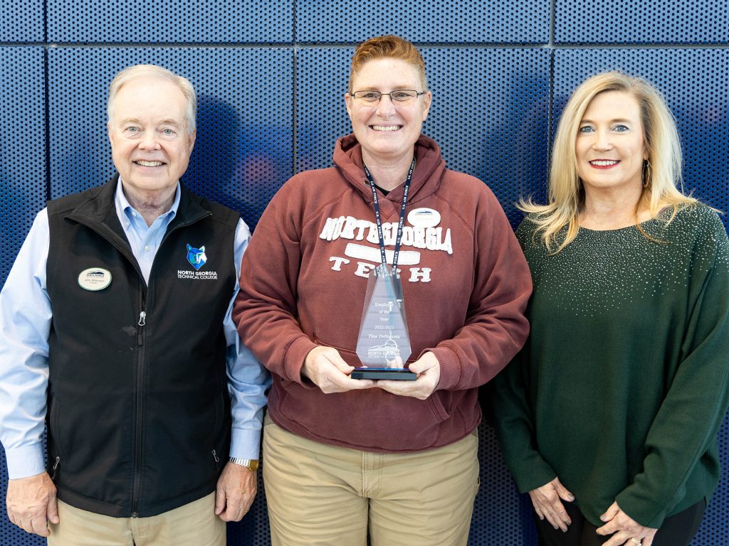 2023 Employee of the Year Award (L to R): NGTC President John Wilkinson; Tina Dellaposta, 2023 Employee of the Year (EOY); and Christy Bivins, NGTC dean of academic affairs and EOY coordinator.